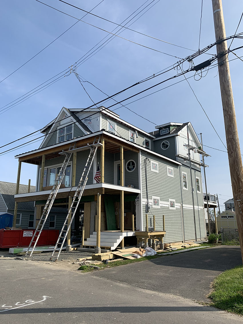 Vinyl sided home installed by Premier Home Designs LLC